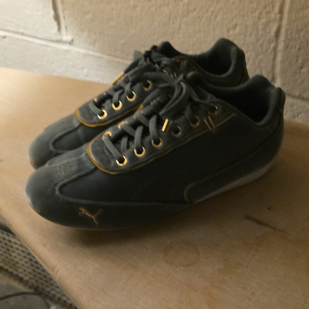 Puma Dark Green Athletic Shoes with Gold Accents